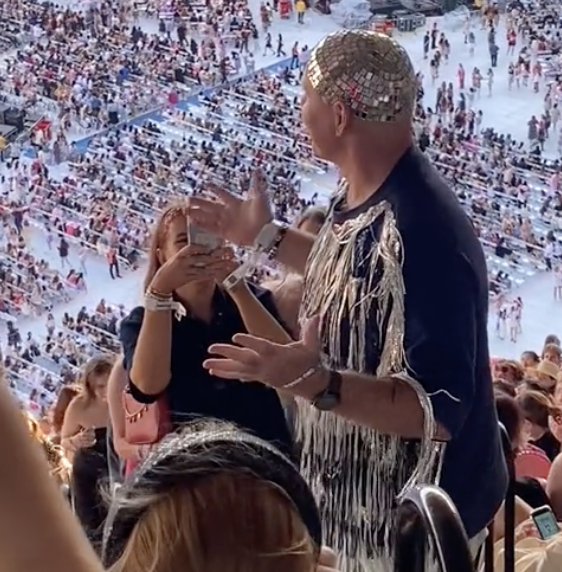 dad wearing sparkly outfit at taylor swift concert